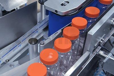Vertical Round Bottle Labeling System