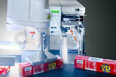 Intelligent Labeling Machine with Robotic Vision Positioning